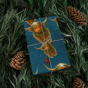 Highland Cow Christmas Wrapping Paper - Celtic Winter Gift Wrap featuring art ornaments & snowfall | Highland Grace, Winter Companions Series by The Teal Leopard™