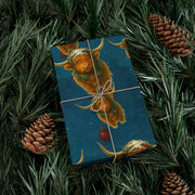 Highland Cow Christmas Wrapping Paper - Celtic Winter Gift Wrap featuring art ornaments & snowfall | Highland Grace, Winter Companions Series by The Teal Leopard™